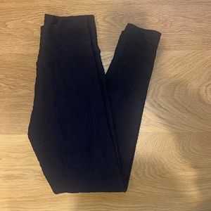 Booty by Brabants textured black leggings. One size fits most.
